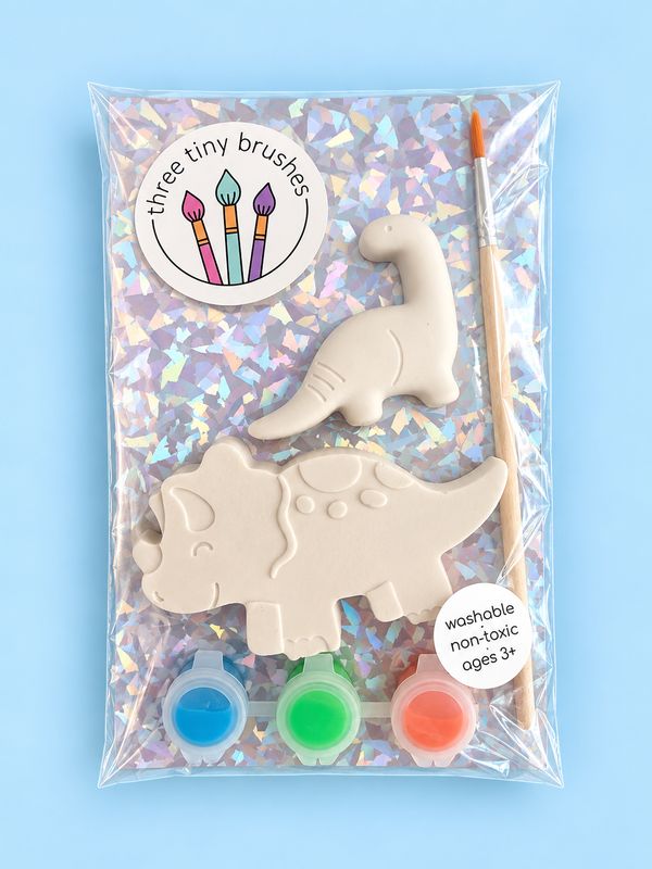 Dino Friends party pack: a paintable long-neck dinosaur and triceratops with three paint pots and a brush