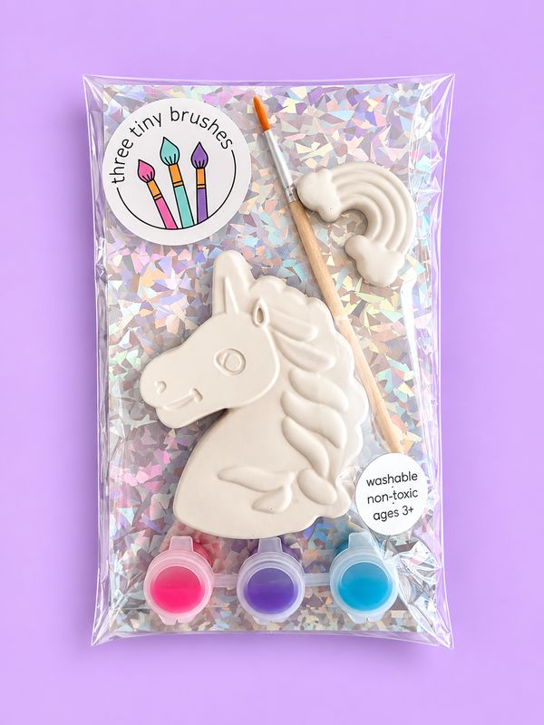Unicorn & Rainbow party pack: a paintable unicorn head and rainbow with three paint pots and a brush